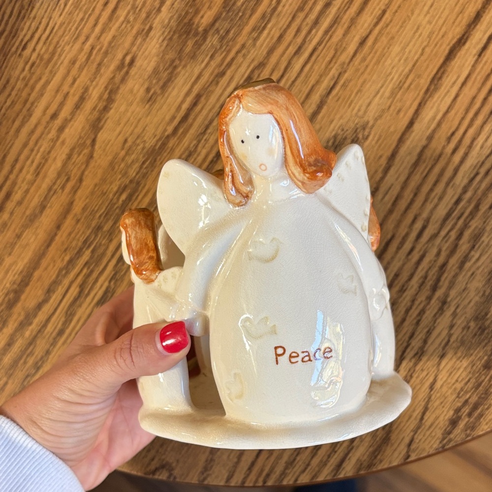 Peaceful Ceramic Angel Figurine with Orange Accents
